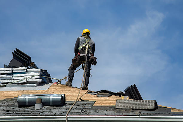 Professional Roofing technician working in Fairport, NY
